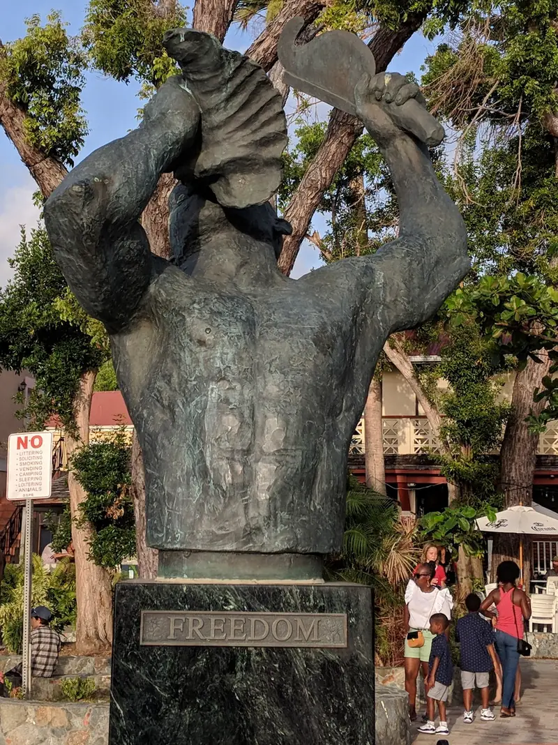 A conch-shell blower on St. John, carrying VI heritage
